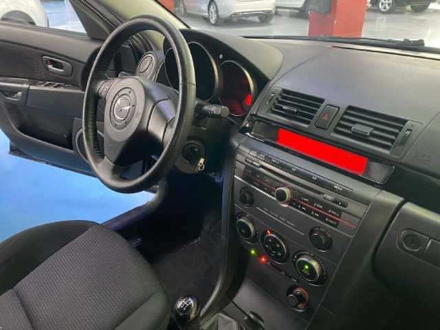 MazdaMazda 3 1.6 VVT Active + 77 kW (105 CV) Vehículo usado en Barcelona - 13 MazdaMazda 3 1.6 VVT Active + 77 kW (105 CV) Vehículo usado en Barcelona - 13